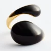 Bague sculpturale à double torsion