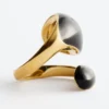 Bague sculpturale à double torsion