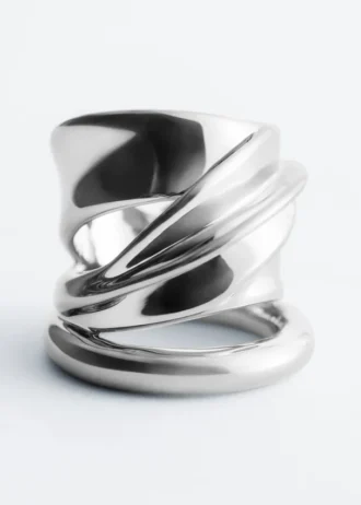 Bague sculpturale à double tour