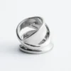 Bague sculpturale à double tour