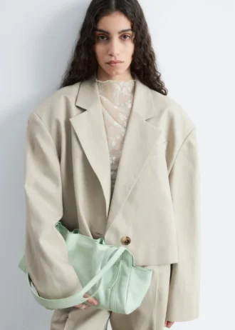 Sac bandoulière en cuir discret
