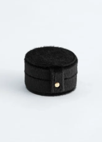Boîte à bijoux en tissu pelucheux