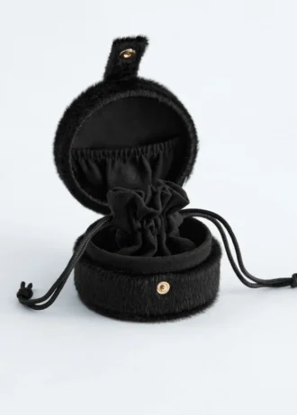 Boîte à bijoux en tissu pelucheux