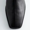 Bottes de chaussettes en cuir