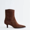 Bottes en daim à talons bobines