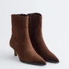 Bottes en daim à talons bobines