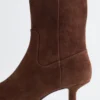 Bottes en daim à talons bobines