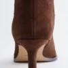Bottes en daim à talons bobines