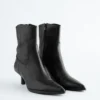 Bottines en cuir à talons bobines