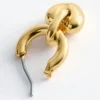 Boucles d&rsquo;oreilles créoles avec pendentif en forme de cœur