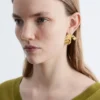 Boucles d&rsquo;oreilles créoles sculpturales