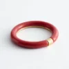 Bracelet rigide en résine et métal contrasté