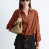 Chemise à carreaux avec cordon de serrage