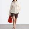 Chemise en lin à plis à la taille