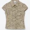 Chemise à nouer dans le dos à motif floral