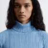Col roulé en maille côtelée lurex