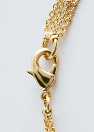 Collier superposé orné