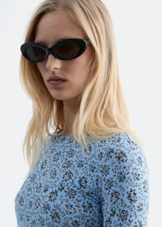 Lunettes de soleil ovales sculptées
