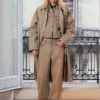 Manteau à carreaux avec ceinture à boucle