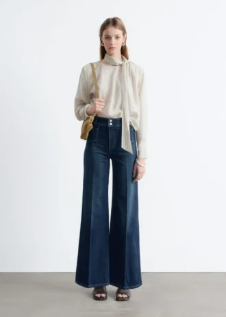 Jeans évasé à plis marqués