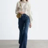 Jeans évasé à plis marqués