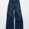 Jeans évasé à plis marqués