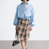 Jupe portefeuille en tartan longueur genou