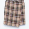 Jupe portefeuille en tartan longueur genou