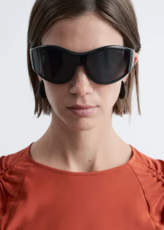 Lunettes de soleil à monture ovale audacieuse