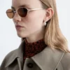 Lunettes de soleil ovales à monture métallique