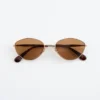 Lunettes de soleil ovales à monture métallique