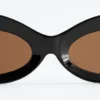 Lunettes de soleil ovales sculptées