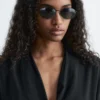Lunettes de soleil rondes à monture métallique