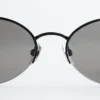 Lunettes de soleil rondes à monture métallique