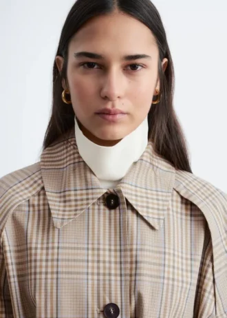 Manteau à carreaux avec ceinture à boucle