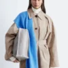 Manteau à carreaux avec ceinture à boucle