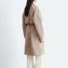 Manteau à carreaux avec ceinture à boucle