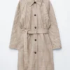 Manteau à carreaux avec ceinture à boucle