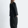 Manteau en cuir avec ceinture à nouer
