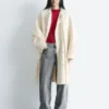 Manteau en laine à franges