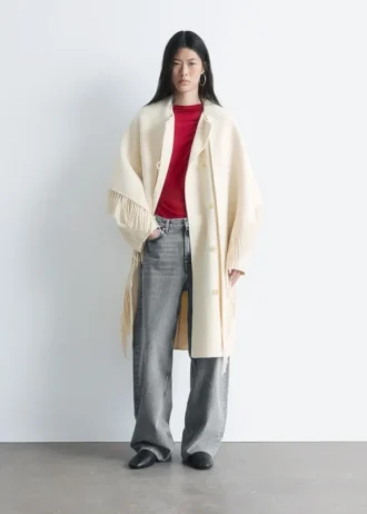 Manteau en laine à franges