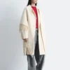 Manteau en laine à franges