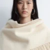 Manteau en laine à franges