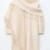 Manteau en laine à franges
