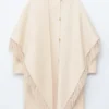 Manteau en laine à franges