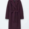 Manteau en laine volumineux avec ceinture