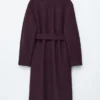 Manteau en laine volumineux avec ceinture