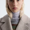 Manteau en laine volumineux avec ceinture