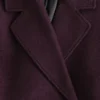Manteau en laine volumineux avec ceinture