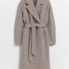 Manteau en laine volumineux avec ceinture